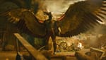 Hawkman posing with destruction around him.
